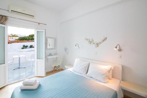 Ένα ή περισσότερα κρεβάτια σε δωμάτιο στο Evas House