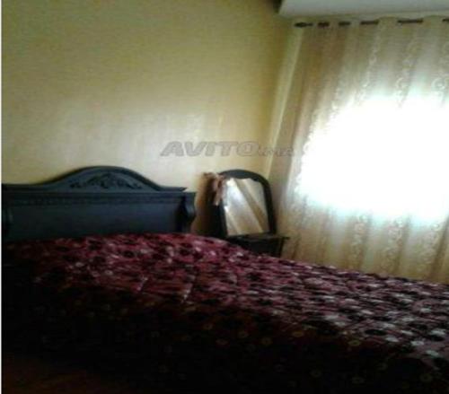 A bed or beds in a room at Appartement à proximité de l'aéroport Mohamed V Casablanca
