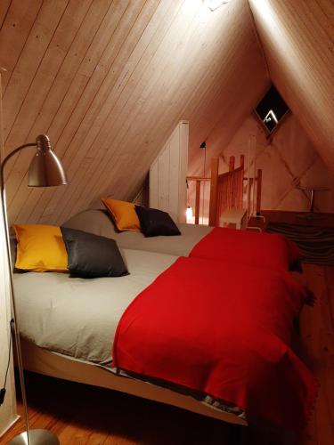 Ein Bett oder Betten in einem Zimmer der Unterkunft Les Epicuriens du Rempart
