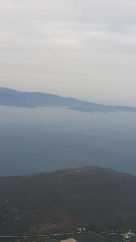 a view of a mountain range with mountains in the background at Rena's house in Pachia Ammos