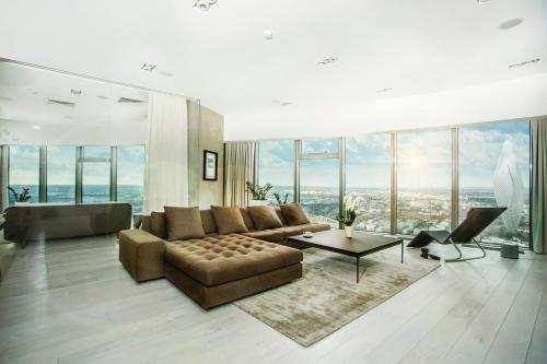 A seating area at 30th+ Floor Apartments in Sky Tower