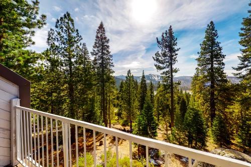 a balcony with a view of trees at Eagle's Nest #87 in Lakeshore