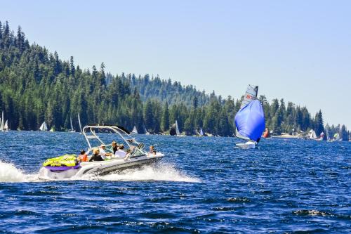 a group of people on a boat in the water at Eagle's Nest #87 in Lakeshore