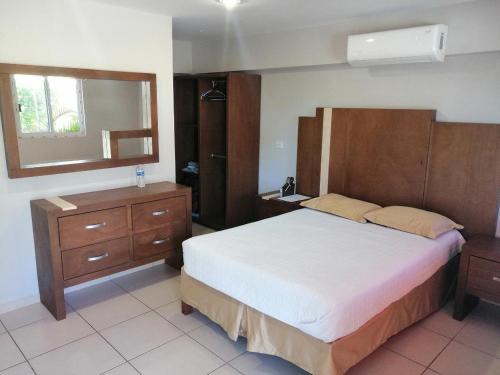 Posteľ alebo postele v izbe v ubytovaní Suites Hgen
