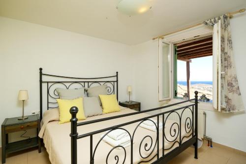 Postel nebo postele na pokoji v ubytování Stella Di Mare family house
