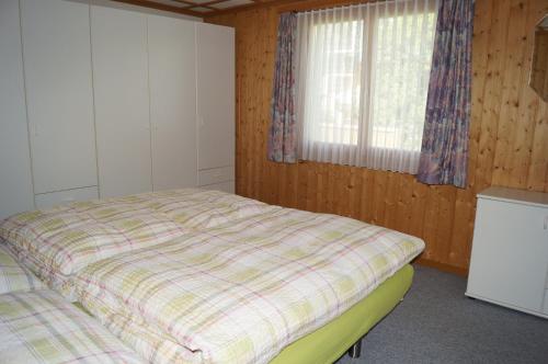 Postel nebo postele na pokoji v ubytování Ferienhaus Schils