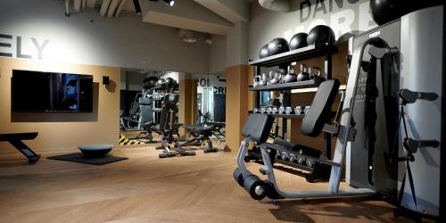 a fitness room with a gym with tread machines at Private Bedrooms with Shared Kitchen, Studios and Apartments at Canvas Arundel House in the heart of Coventry in Coventry