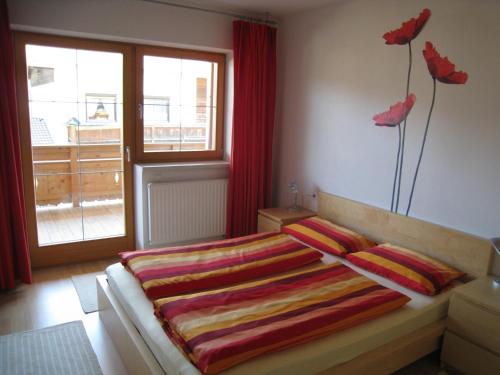Posteľ alebo postele v izbe v ubytovaní Mesnerhof