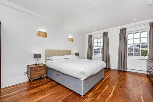 En eller flere senger på et rom på Marylebone Apartment