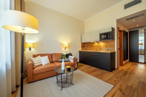 Kuchyň nebo kuchyňský kout v ubytování Design Merrion Hotel