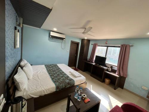 Hotel Pratap Residencyにあるベッド