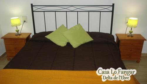 Tempat tidur dalam kamar di Casa Lo Fangar - Delta de l'Ebre - 4 dobles 2 lliteres
