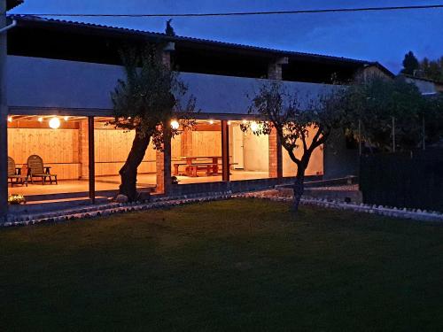 a house at night with the lights on at El Boix in Santa Maria de Besora