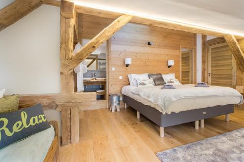Ένα ή περισσότερα κρεβάτια σε δωμάτιο στο Chalet Lumina