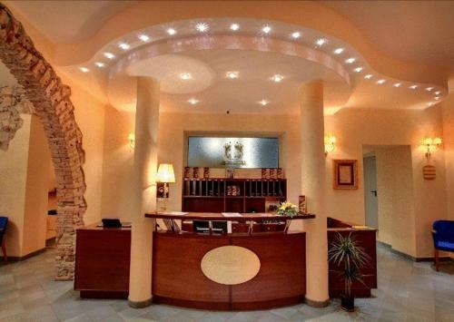 a lobby with a bar in a building at B&B San Matteo in Scalea