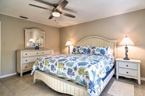 a bedroom with a bed and two night stands at Indian Rocks Beach Home - 2 Blocks to Beach! in Clearwater Beach