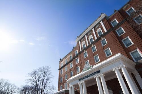 a large brick building with a building with a courthouse at Rodd Charlottetown in Charlottetown