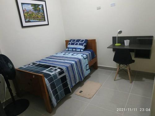 Brazilian's House - Agradable casa amoblada tesisinde bir odada yatak veya yataklar