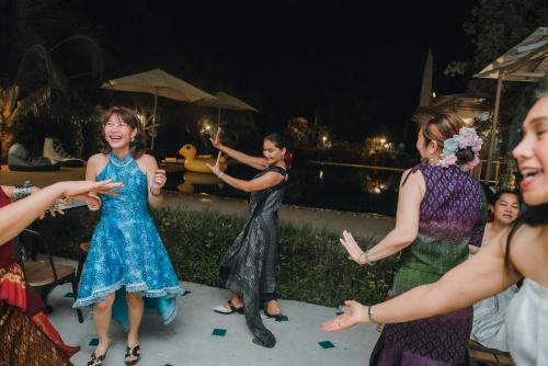 a group of women dancing at a party at Project 17 in Hua Hin