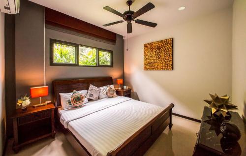 Cama o camas de una habitación en VILLA EMERE | Private Pool | Onyx Villas by Tropiclook | Naiharn beach