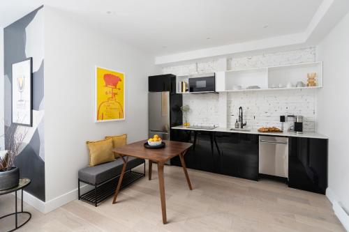 Kuchyň nebo kuchyňský kout v ubytování François-Denis Apartments