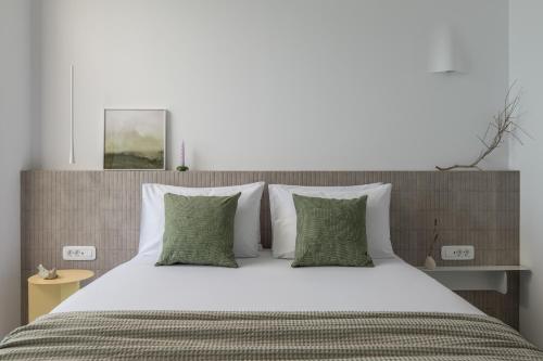 En eller flere senge i et værelse på Villa Mimaze Minimalist Living