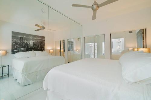מיטה או מיטות בחדר ב-Casa Costa 309 South Studio