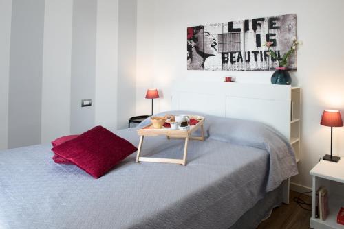 Postel nebo postele na pokoji v ubytování Le terrazze di casa Bonelli
