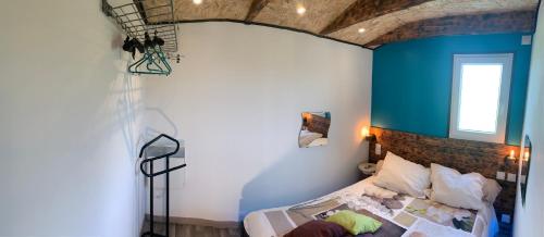 Postel nebo postele na pokoji v ubytování T1, spa privé accès piscine sauna