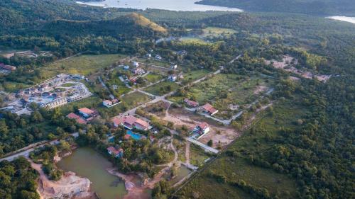 an aerial view of a house on a river at Bella Villa Coron in Coron
