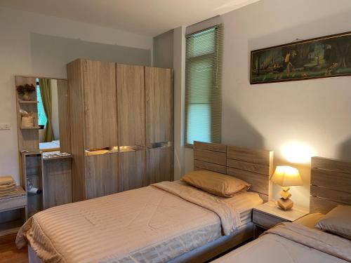 Llit o llits en una habitació de Khaokhab Lodge