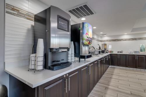 a kitchen with a counter with a coffee maker on it at Quality Inn Kodak Sevierville in Kodak