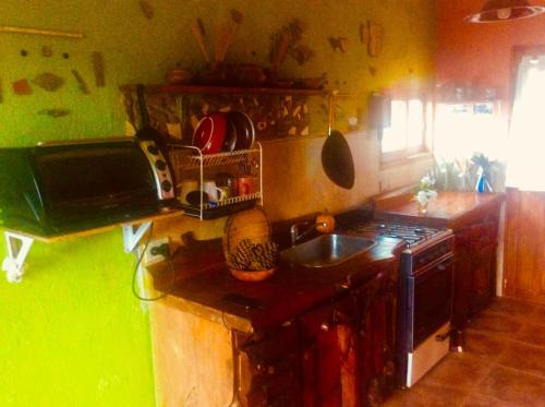 Una cocina o kitchenette en Casa Vieja Estancia