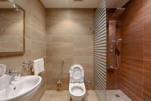 Kúpeľňa v ubytovaní وحدات دورميرا الفندقيه