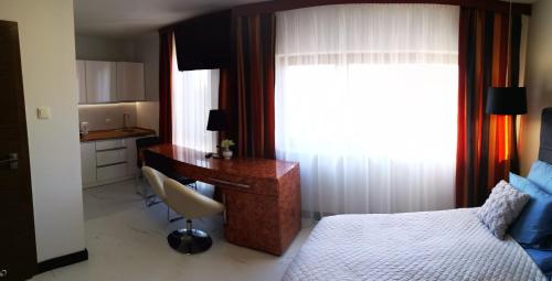 Posteľ alebo postele v izbe v ubytovaní 317 w ROYAL TULI SAND prywatny APARTAMENT przy plaży z aneksem kuchennym