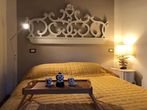 Кровать или кровати в номере La Magnolia