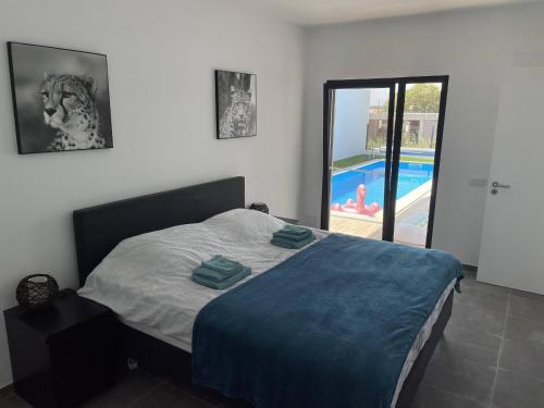 Ένα ή περισσότερα κρεβάτια σε δωμάτιο στο Casa Felino