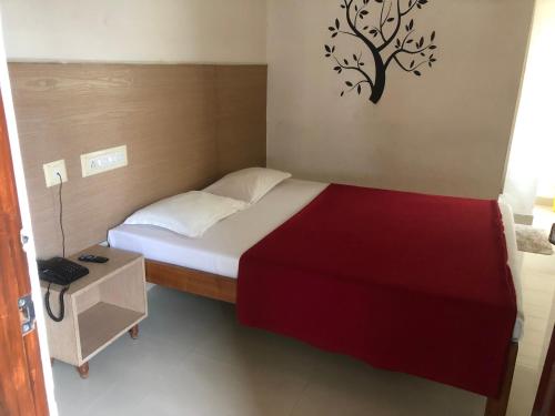 Postel nebo postele na pokoji v ubytování Star Residency