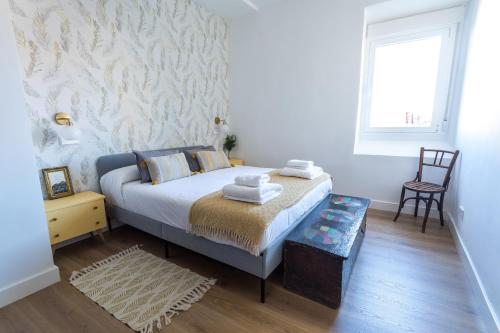 Ένα ή περισσότερα κρεβάτια σε δωμάτιο στο Casa Tío Maxi - Siglo XVIII