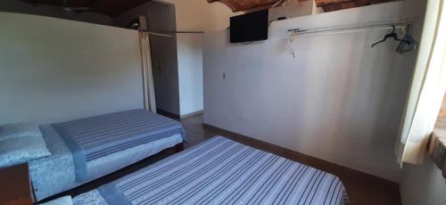 Postel nebo postele na pokoji v ubytování Villas del monteón