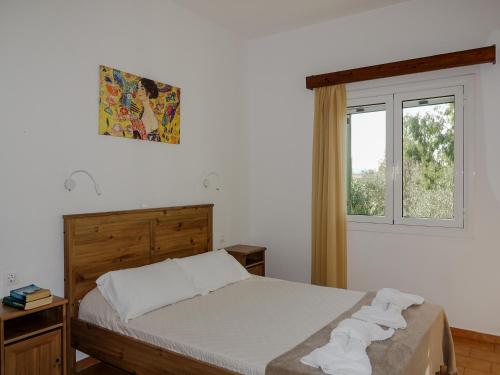 Postel nebo postele na pokoji v ubytování Villa Leda