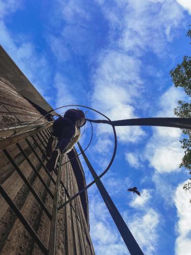 a bird is standing on the side of a building at Kullapesa in Kullamaa