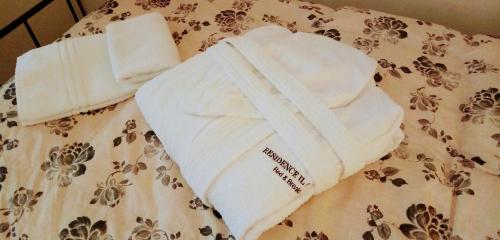Postel nebo postele na pokoji v ubytování B&B Residence il Ciliegio , Via Villa Superiore 93 Luzzara