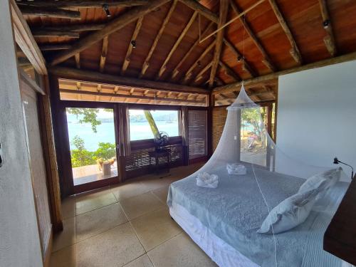 A bed or beds in a room at Paraíso Azul Retiro