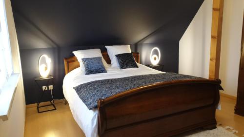 Кровать или кровати в номере Chambre d'hôtes Le Lavandin