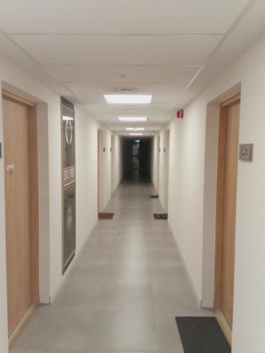 an empty hallway in an office building at Róża- Lotnisko in Wrocław