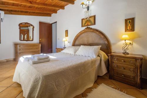 Uma cama ou camas num quarto em Cubo's La Casa del Rio