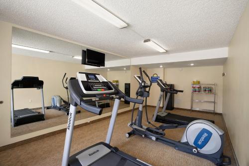 a room with a gym with two tread machines at Days Inn of Frederick by Wyndham in Frederick