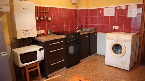 Una cocina o cocineta en Excelsior Guesthouse