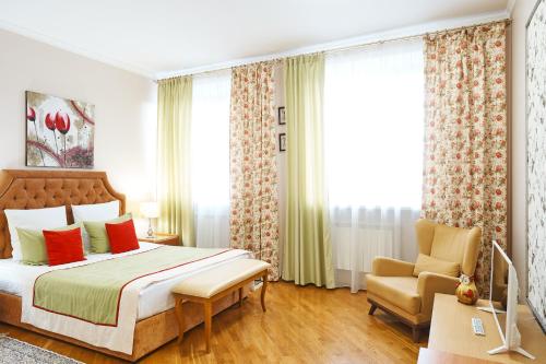 Ein Bett oder Betten in einem Zimmer der Unterkunft Hotel PoliArt